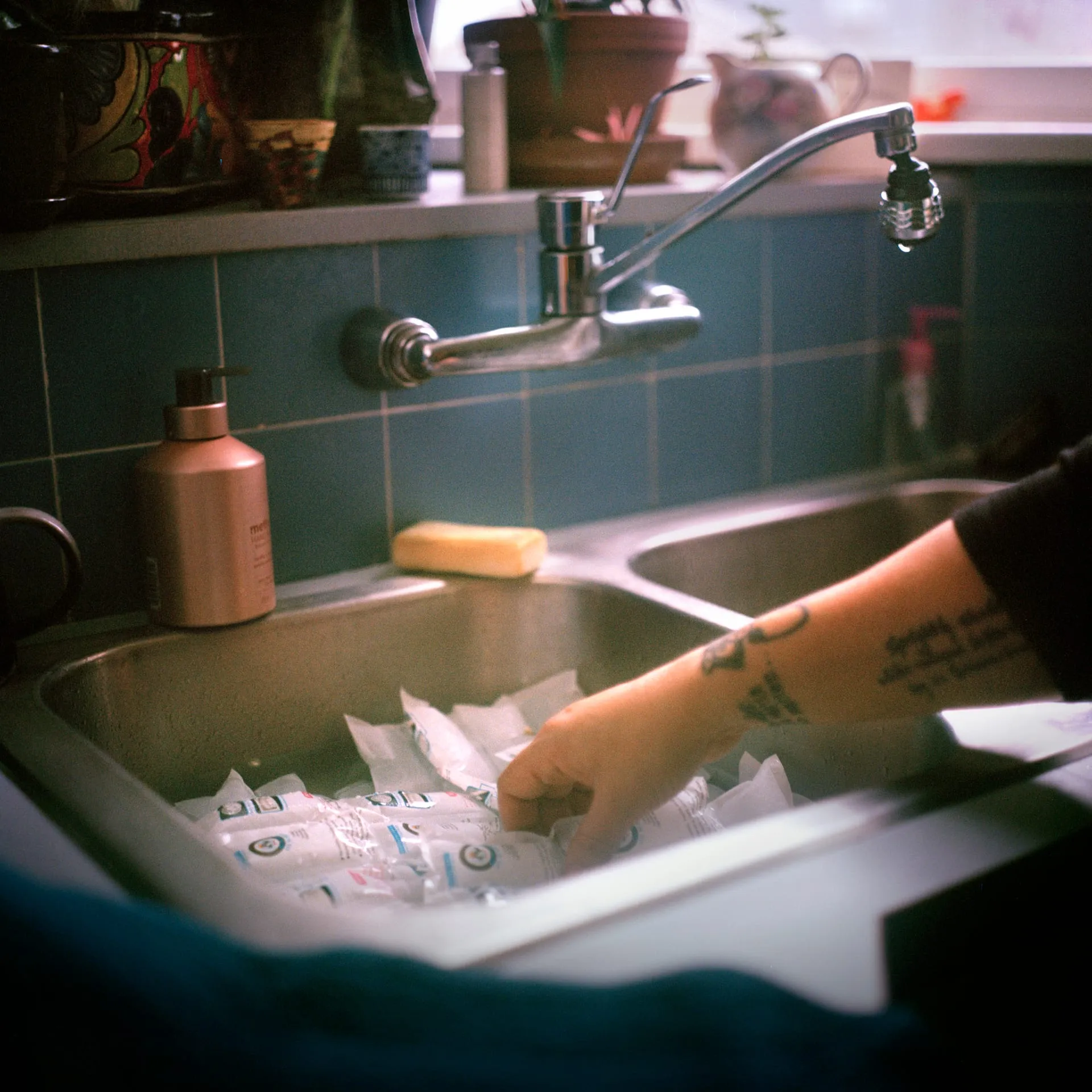 The death doula prepares ice packs to place under the guest's body after they have died, “The stuff we do is sacred. You have to go into a room and tell someone that they’re dying. You cannot fuck this up.”