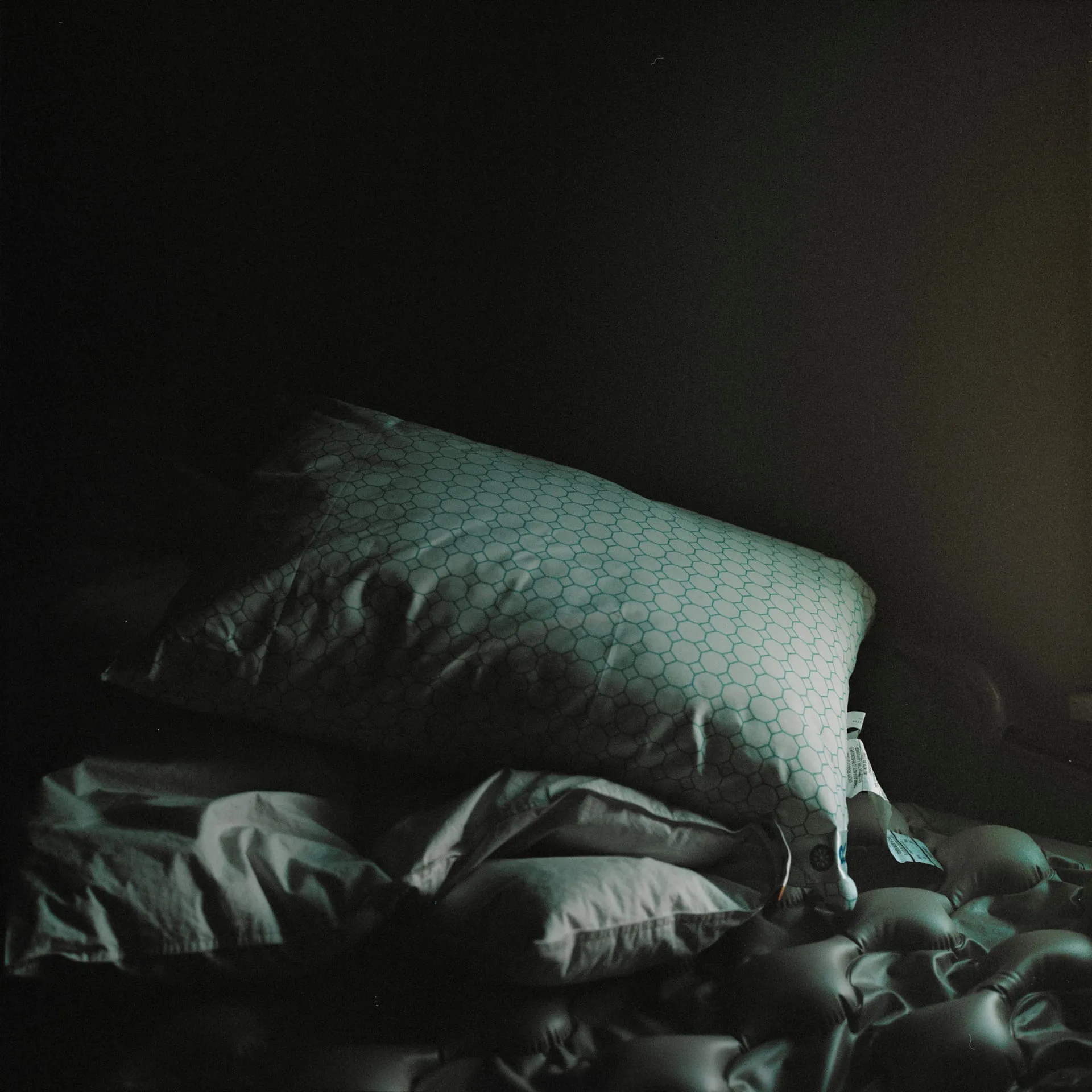 Preparations for the guest's death start before their arrival. Although the house feels far from a clinical establishment, underneath the soft-colored bedsheets are heated mattresses and the beds themselves are adjustable, like those found in hospitals.