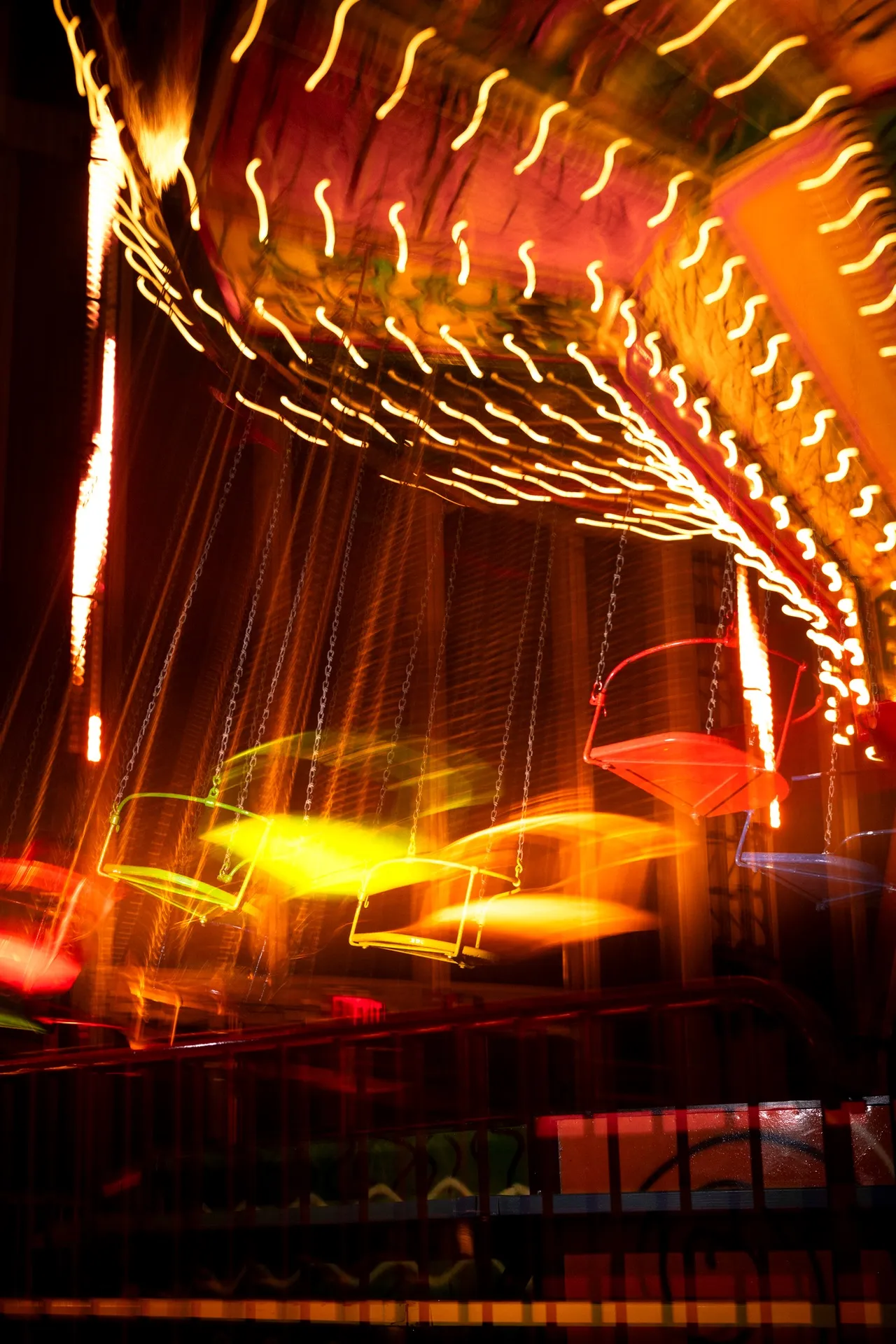 The painted swing ride by Kenny Scharf at Luna Luna.